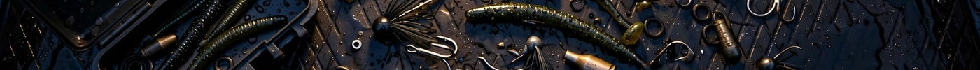 Night fishing tackle flat lay on a dark boat deck