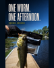 Largemouth bass caught on an ERHAI 5-inch Pumpkin stick worm in clear water near Omemee Ontario